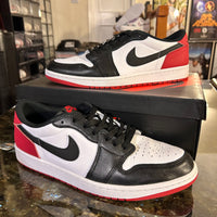 Black toe Jordan 1 lows