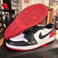 Black toe Jordan 1 lows